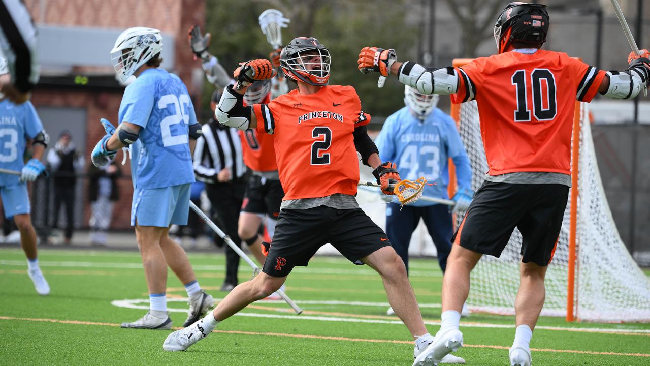 Princeton's Nate Kabiri flexes after a goal against North Carolina