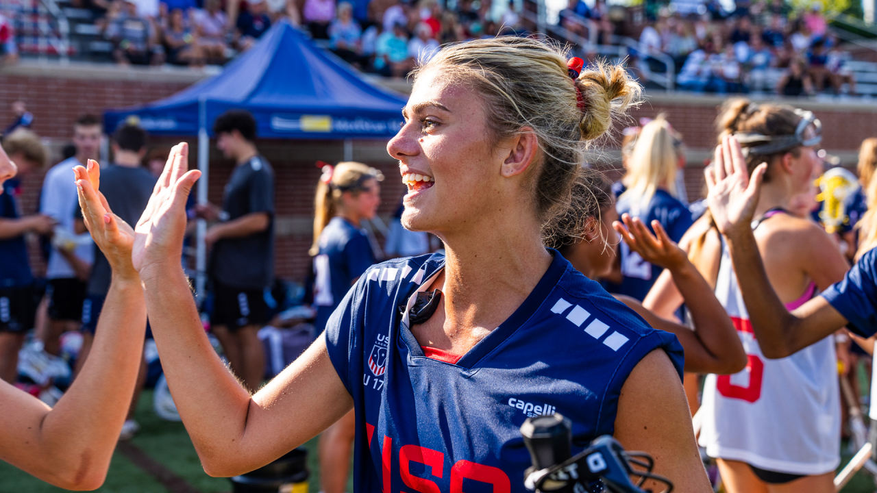 Players from the U.S. U17 Girls' Youth National Team and Canada East exchange handshakes after the game at Tierney Field.